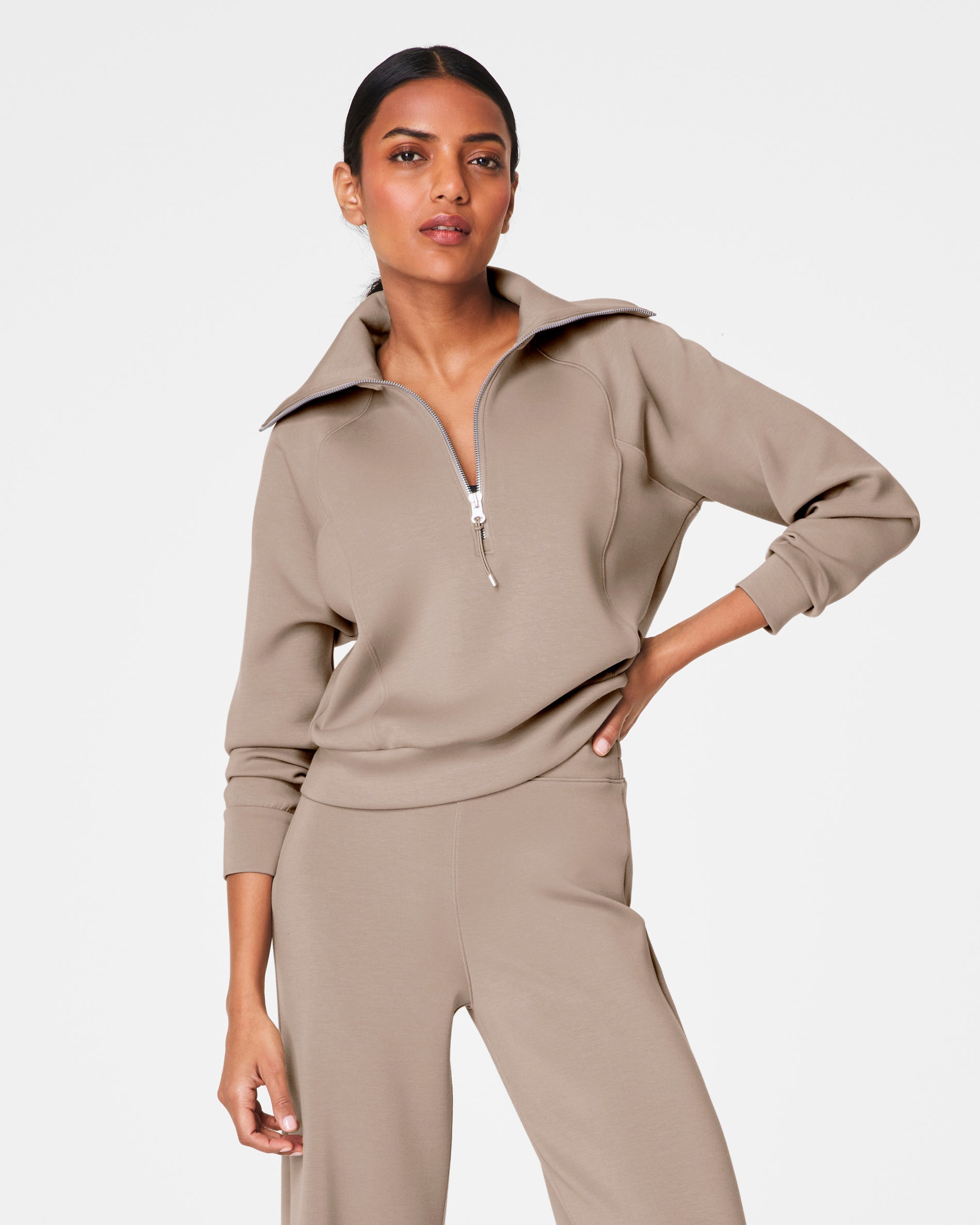 Lightweight drapey half zip pullover with relaxed fit