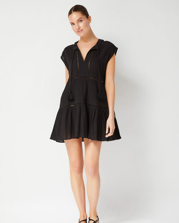 Gari dress flowing in beach breeze