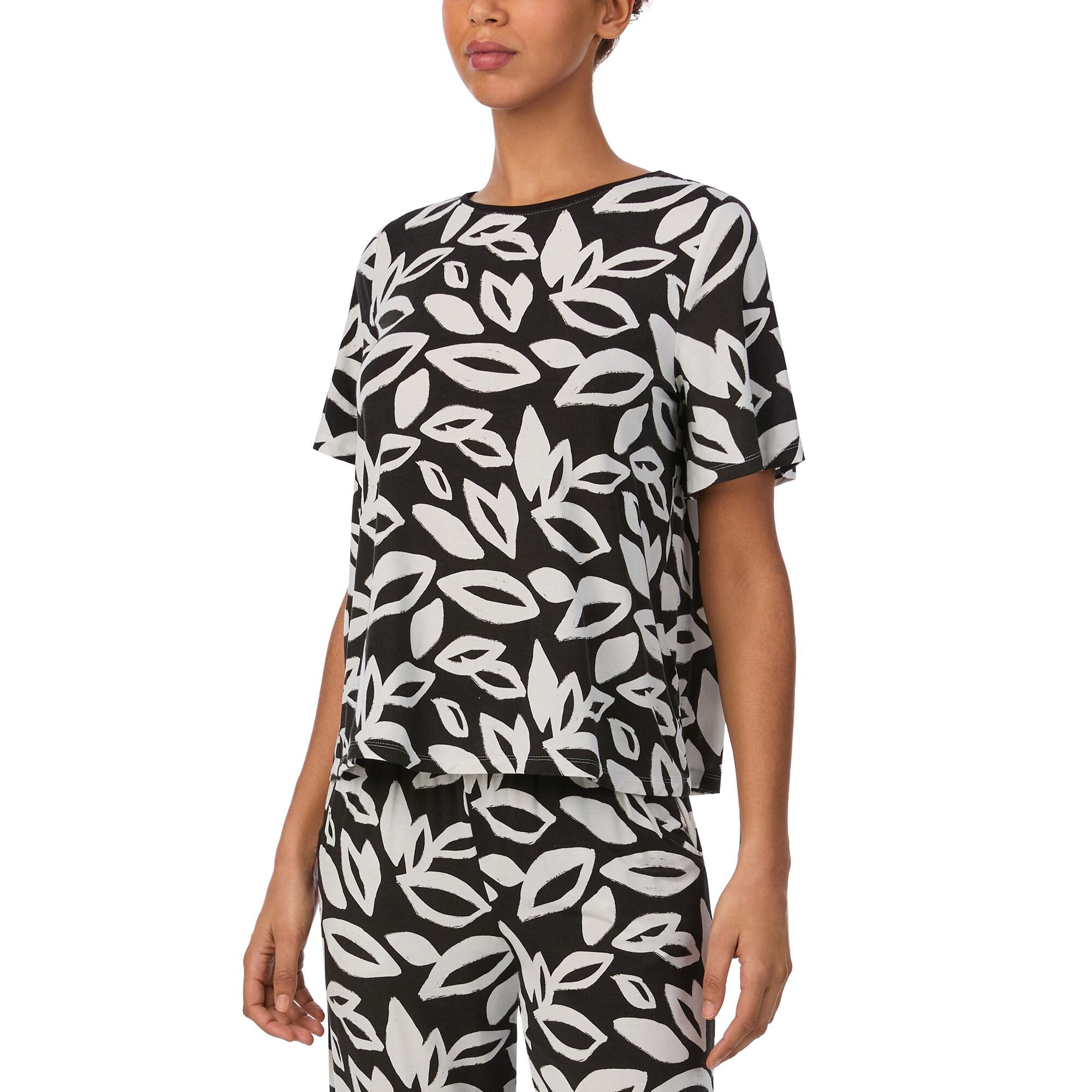 Black printed cropped sleep pants with pockets by DKNY